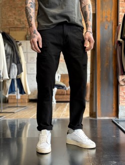 RYTUAL jeans nero con rotture RYTUAL jeans nero con rotture